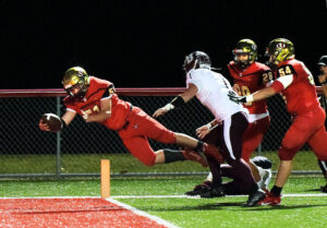 University answers early punches from Woodrow Wilson to open playoffs with 52-10 win